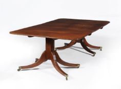 A Regency mahogany twin pedestal dining table