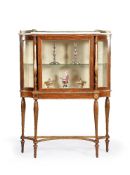 ϒ A Regency rosewood and parcel gilt cabinet on stand