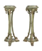 A pair of Louis XVI style green and silver-painted composition and carved wood jardiniere stands