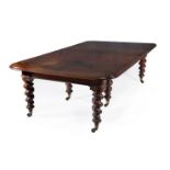 A Victorian mahogany extending dining table