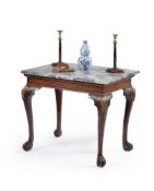 A George II mahogany and parcel gilt centre table