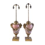 A pair of Continental gilt metal mounted jasper table lamps in Louis XVI style