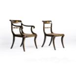 A set of ten simulated coromandel and gilt lacquer and parcel gilt dining chairs