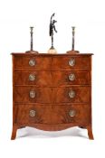 A George III mahogany and satinwood banded serpentine fronted chest of drawers