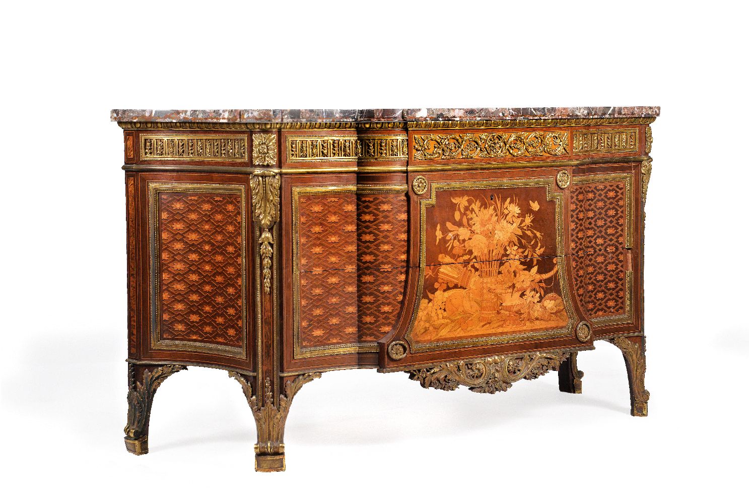 THE BROCKET HALL COMMODES A pair of ormolu mounted marquetry and parquetry commodes by HENRY DASSON