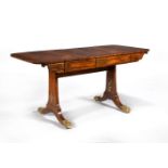 ϒ A Regency rosewood, coromandel banded and gilt metal mounted sofa table