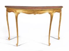 A George III satinwood marquetry and giltwood demi-lune side table