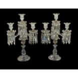 A pair of Baccarat four light cut and moulded glass candelabra