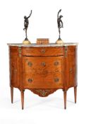 A French tulipwood, specimen marquetry and giltmetal mounted commode