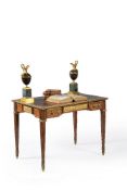 A Victorian mahogany and gilt metal mounted writing table