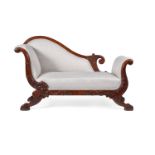 A Continental carved mahogany and upholstered day bed