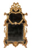 A carved giltwood wall mirror, in George III style, 20th century