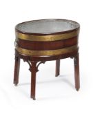 A George III mahogany and brass bound wine cooler