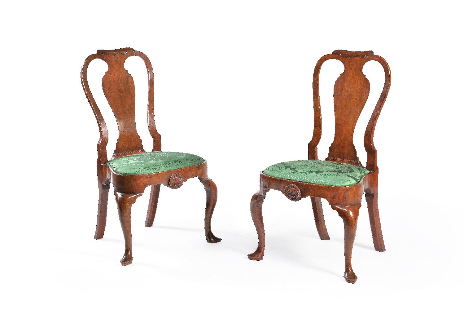 A pair of George II walnut chairs