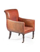 ϒ A Regency rosewood and studded leather upholstered library armchair