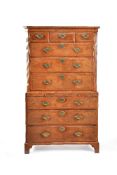 A George II figured walnut and featherbanded chest on chest