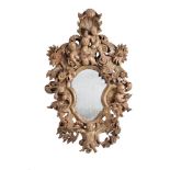 An Italian carved and painted wood girandole wall mirror