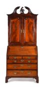 A George III mahogany bureau cabinet