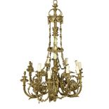 A gilt and painted metal twelve light chandelier in Louis XVI style