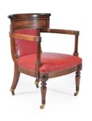 ϒ A Regency mahogany and ebony armchair