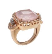 A rose quartz and diamond ring