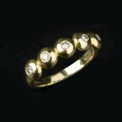 An 18 carat gold five stone diamond ring by Theo Fennell