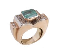 A emerald and diamond dress ring