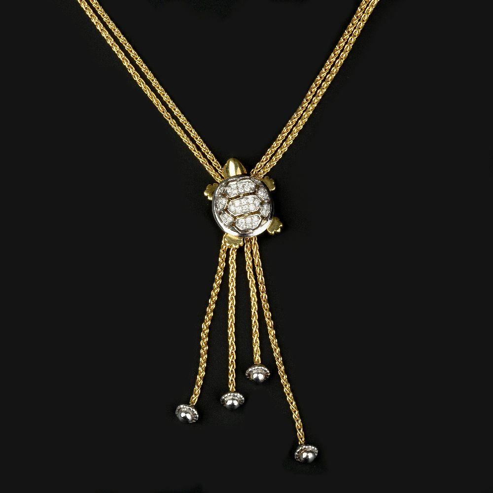 A diamond turtle necklace