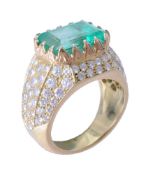 A French emerald and diamond dress ring