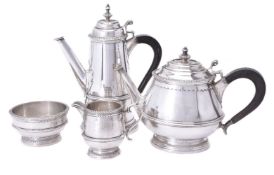 An Italian silver coloured four piece tea and coffee service by Serra Roma