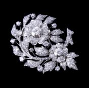 A diamond floral spray brooch pendant