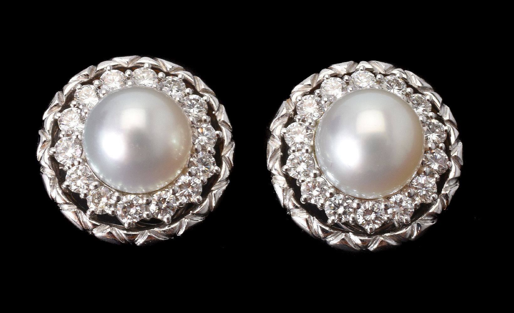 A pair of diamond and cultured pearl cluster ear clips