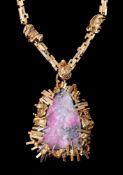 A late 1960s 18 carat two colour gold rhodochrosite crystal pendant by Gilian Packard