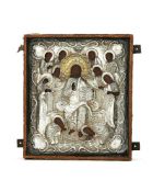 A mid 19th century Russian icon of Christ in Majesty in a silver parcel gilt oklad