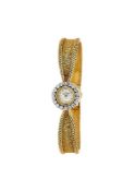 Jaeger LeCoultre, a lady's gold coloured and diamond bracelet watch