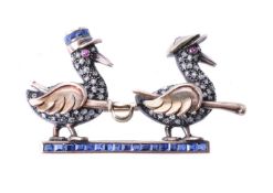 A 1940s French Tunisian diamond and sapphire novelty Gendarme duck brooch