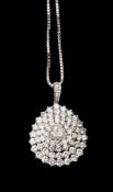 An 18 carat gold diamond cluster pendant on chain
