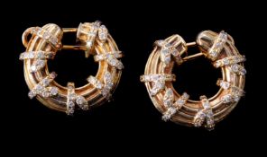 A pair of hooped diamond earrings