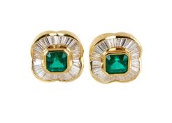 A pair of diamond and emerald cluster earrings