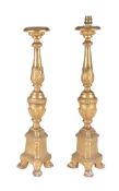 A pair of Italian turned and carved giltwood pricket altarsticks fitted as table lamps