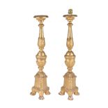 A pair of Italian turned and carved giltwood pricket altarsticks fitted as table lamps