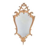 A gilt wood wall mirror in Baroque taste