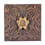 A Continental probably Italian, carved, gilded and painted walnut ceiling armorial panel