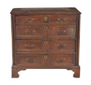 A Charles II oak chest of drawers