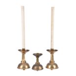 A pair of brass candlesticks, early 20th century