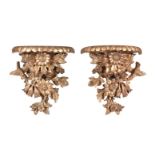 A pair of carved giltwood wall brackets in Rococo taste