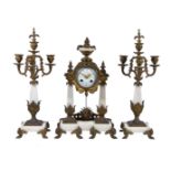 A marble and gilt metal mounted clock garniture, late 19th century