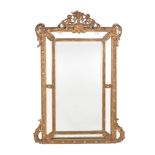 A giltwood and composition marginal wall mirror