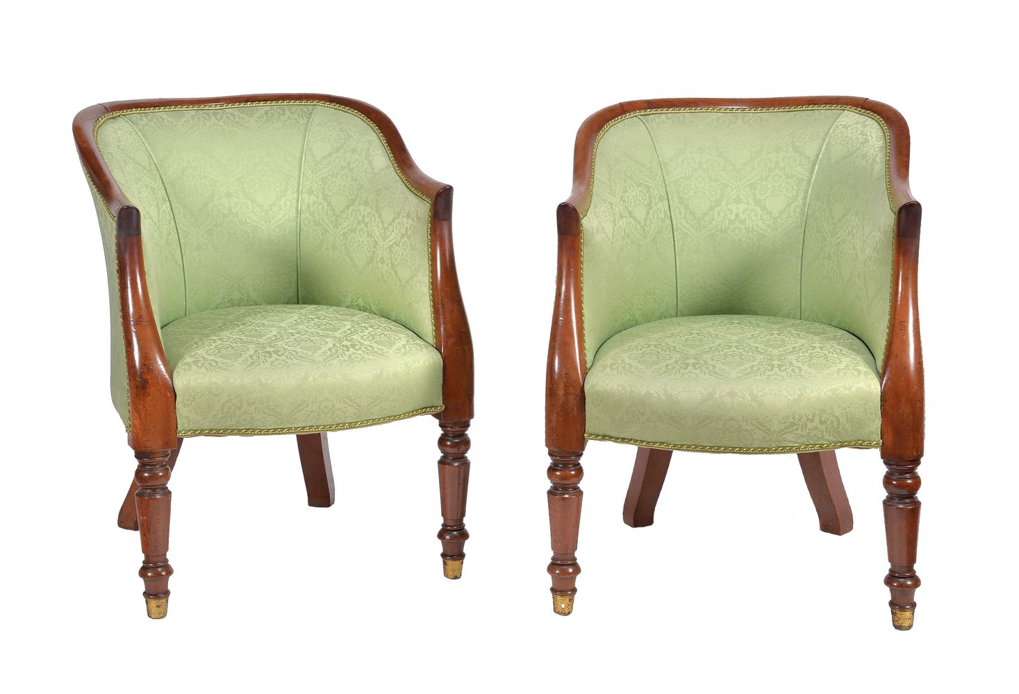 A pair of George IV mahogany and upholstered armchairs