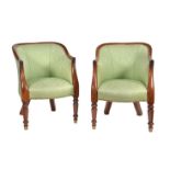 A pair of George IV mahogany and upholstered armchairs